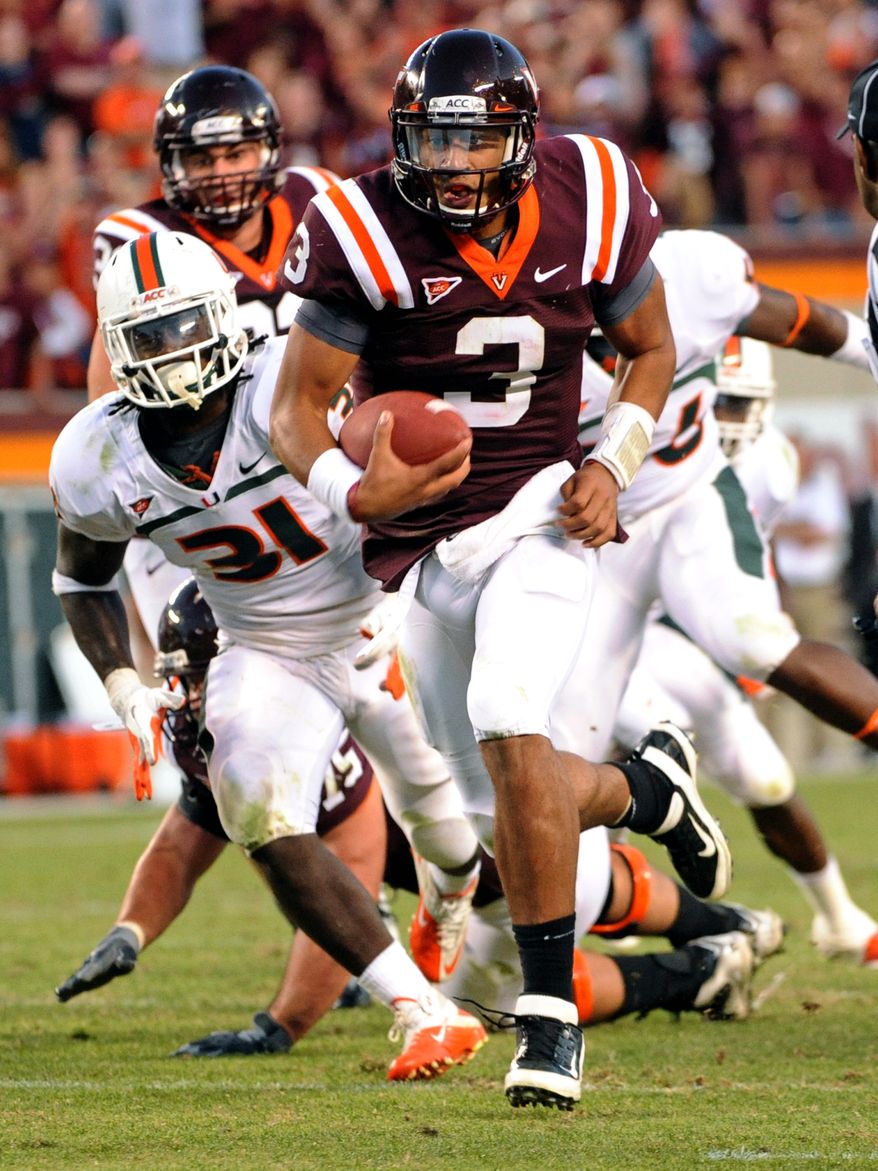 Virginia Tech sophomore quarterback Logan Thomas passed for 310 yards and three touchdowns and also rushed for two scores Saturday in a 38-35 victory over Miami. (Associated Press)