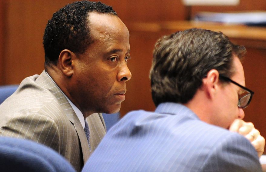 Dr. Conrad Murray listens in court Oct. 11, 2011, during his involuntary manslaughter trial in Los Angeles. Murray has pleaded not guilty and faces four years in prison and the loss of his medical license if convicted of involuntary manslaughter in Michael Jackson's death. (Associated Press)