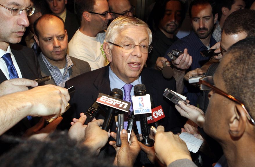 NBA Commissioner David Stern (center) talks Oct. 10, 2011, with reporters after leaving an NBA labor talks meeting in New York. Stern canceled the first two weeks of the season after players and owners were unable to reach a new labor deal to end the lockout. At left is Deputy Commissioner Adam Silver. Opening night was scheduled for Nov. 1. (Associated Press)