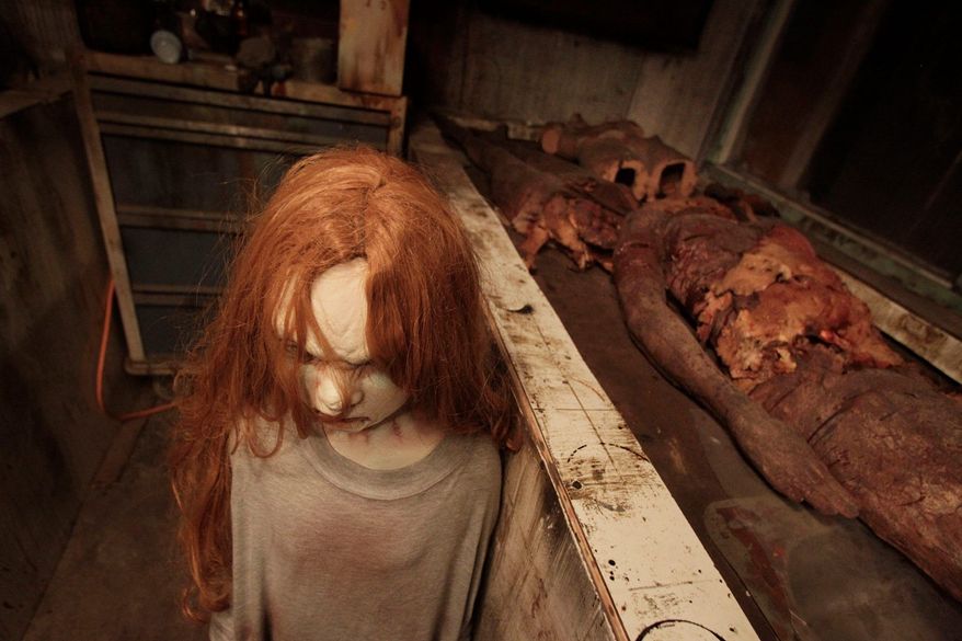 A scene from the House of Shock, a haunted house, in New Orleans. Halloween-season attractions like House of Shock are big business. (Associated Press)