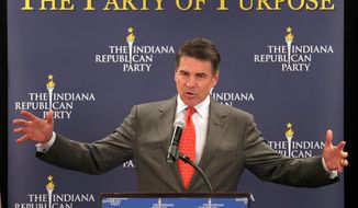 Texas Gov. Rick Perry, a Republican presidential candidate, speaks at a GOP forum in Indianapolis on Wednesday. Backers are saying he failed to reach out to evangelical Christians and has done a poor job on using surrogates. (Associated Press)