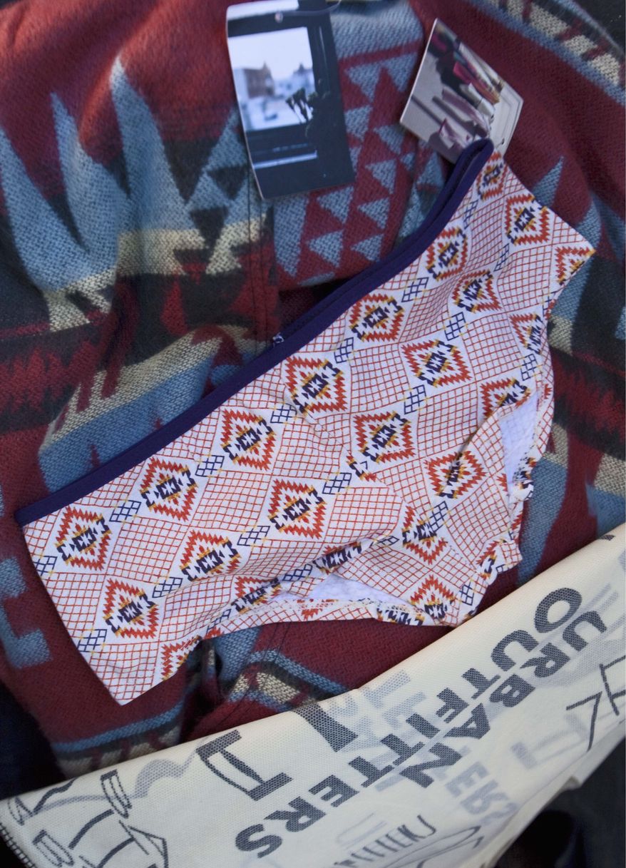 Urban Outfitters' line of Navajo-branded clothing and accessories has set off a firestorm. Branding underwear as "Navajo" goes against the tribe's spiritual beliefs of modesty and avoidance of indecency, a designer from the tribe says. (Associated Press)