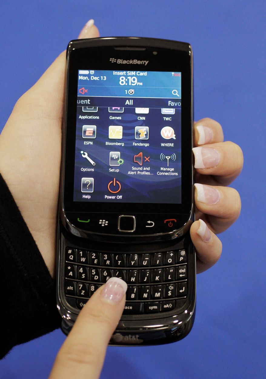 BlackBerry users are being offered free apps including iSpeech Translator, Bejeweled and Texas Hold'em after massive service outages last week. (Associated Press)