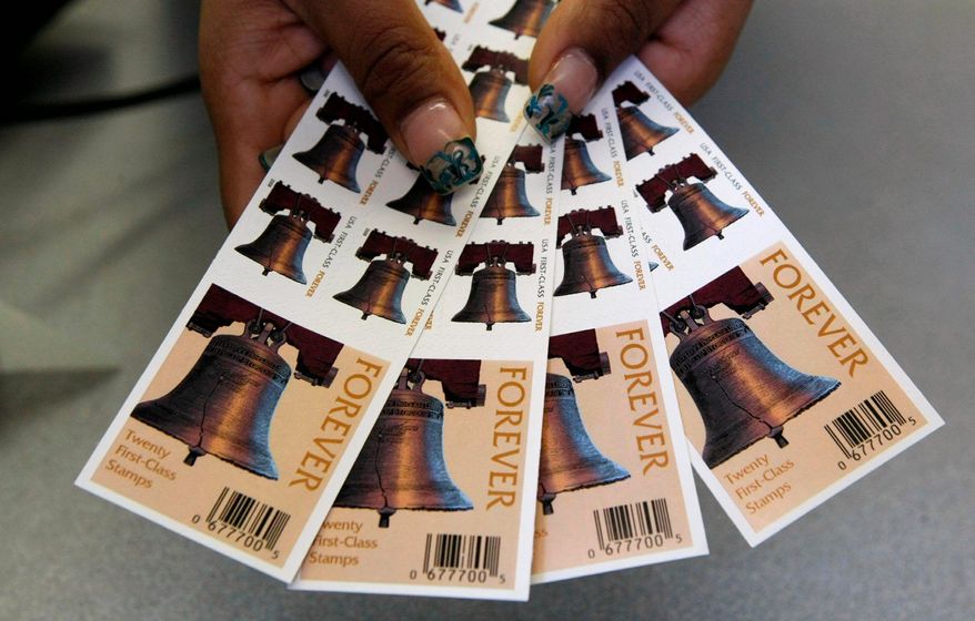 The cost of first-class stamps will increase to 49 cents on Jan. 22, 2017. (Associated Press) **FILE**