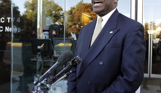 Republican presidential candidate, businessman Herman Cain, speaks with the media after an interview on NBC&#39;s Meet the Press at their studio in Washington on Sunday, Oct. 16, 2011. (AP Photo/Jose Luis Magana)