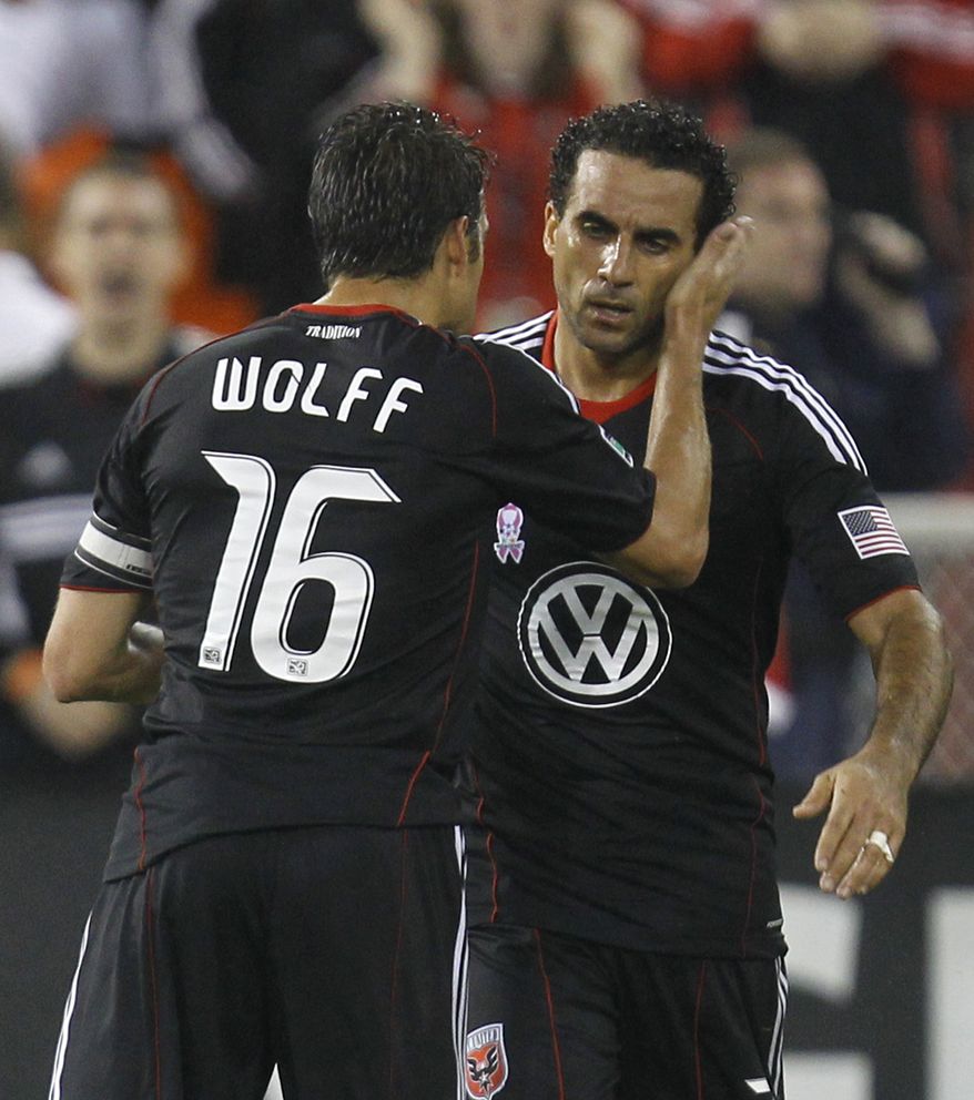 United acquired Dwayne de Rosario (right) from the Red Bulls midway through last season, and he went on to score 13 goals in 18 matches in an MVP season. (AP Photo/Luis M. Alvarez)