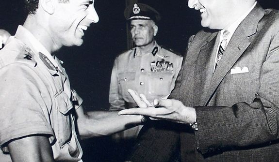 In this photo from October 1969, Col. Moammar Gadhafi (left) appears with Egypt&#39;s Prime Minister Gamal Abdel Nasser (right) during his first official visit to Egypt after a military coup in Libya. (Associated Press)