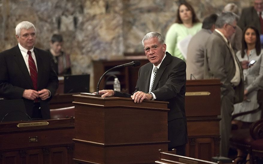 Rep. Ronald Buxton, D-Dauphin, speaks in favor of a bill aimed at giving Pennsylvania Gov. Tom Corbett the power to force Harrisburg, Pa., into a state-sanctioned plan to deal with its staggering debt, Wednesday, Oct. 19, 2011, at the Capitol in Harrisburg. The House voted to send the measure to the governor. (AP Photo/The Patriot-News, Christine Baker)