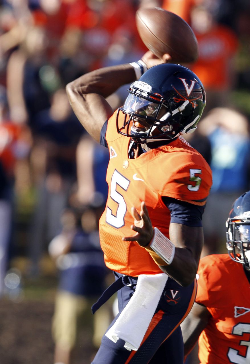 Virginia quarterback David Watford completed only 4 of 16 passes for 89 yards and three interceptions against NC State on Saturday. (AP Photo/Steve Helber)