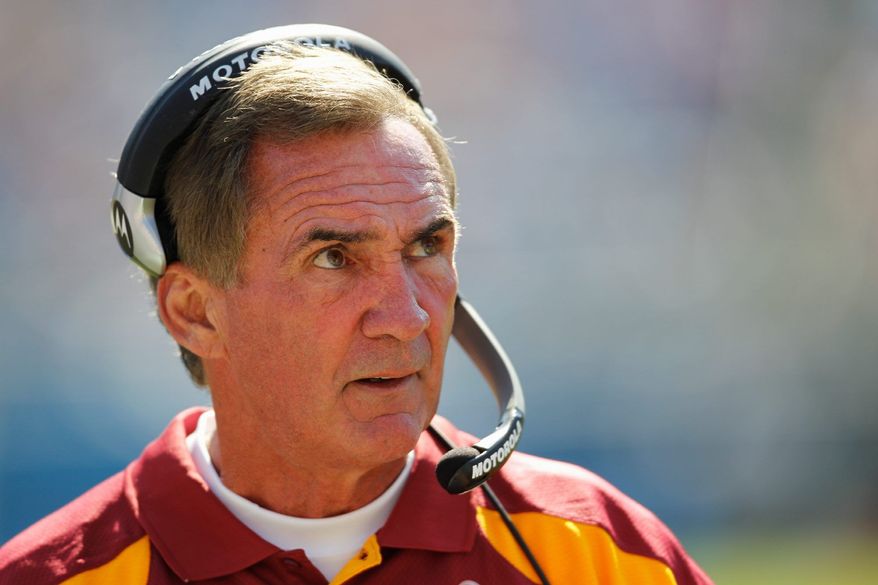 Quarterback John Beck had a passer rating of 80.8 in his debut as the Redskins starter Sunday. The problem was, Carolina's Cam Newton's number was 127.5 and the rookie from Auburn was the difference in the game's outcome.ASSOCIATED PRESS
Head coach Mike Shanahan was protective of quarterback John Beck in the first half with his play called. After halftime, he opened up the offense a bit.