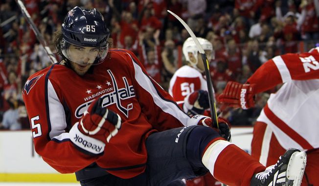 Washington Capitals center Mathieu Perreault is looking for more playing time after seeing limited shifts through the first two games. (AP Photo/Ann Heisenfelt)