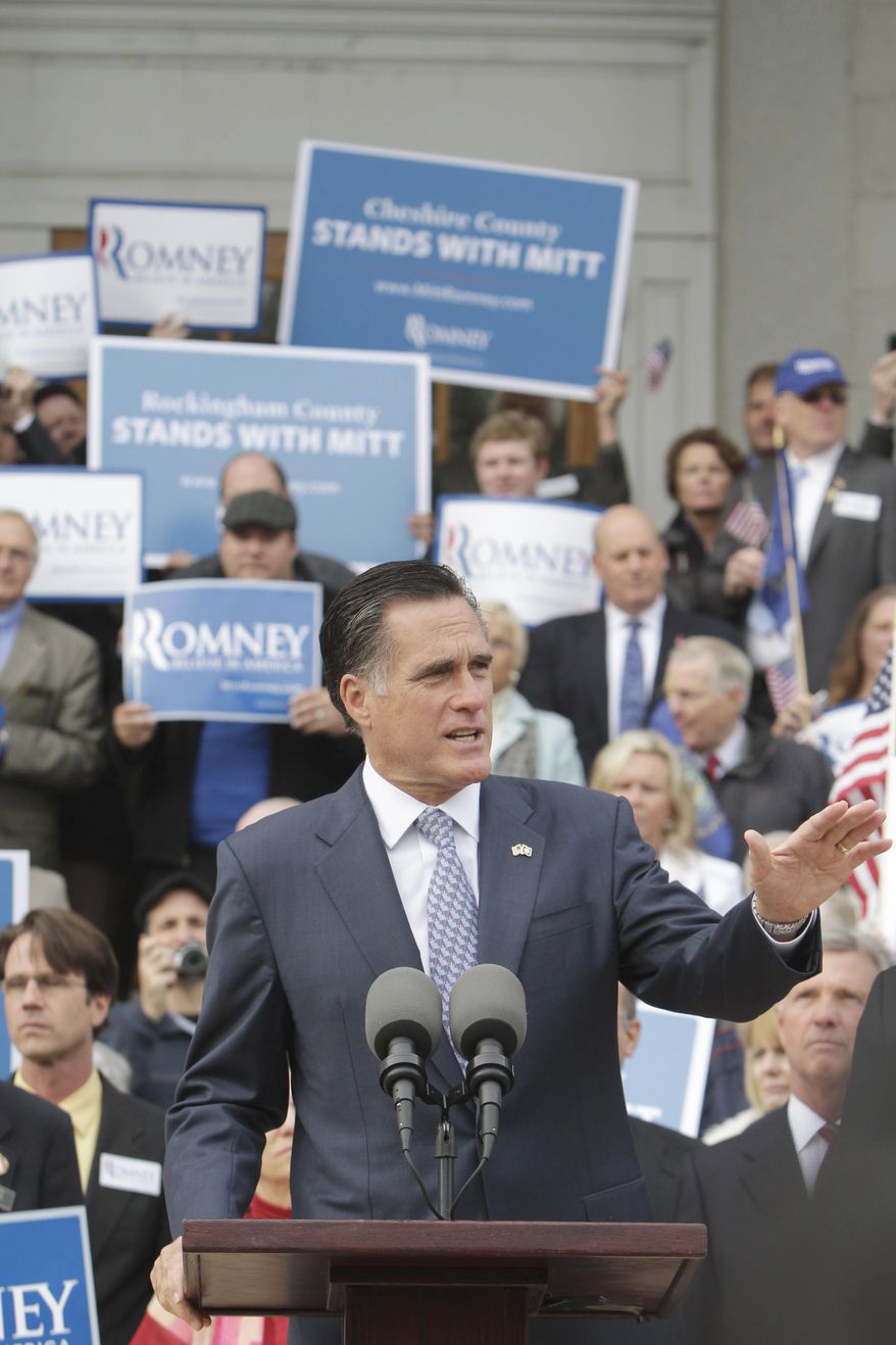 Republican presidential candidate and former Massachusetts Gov. Mitt Romney talks to supporters in front of the State House in Concord, N.H., on Oct. 24, 2011, after filing his papers to be on the ballot for the state&#39;s presidential primary. (Associated Press)