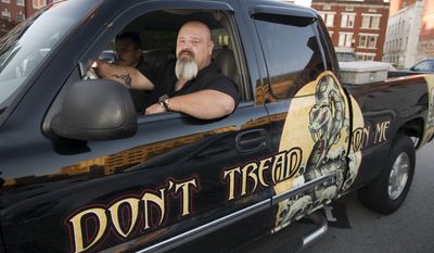 Darren Wesley Huff of Dallas, Ga., waits in his truck for the jury to return a verdict in his federal trial on firearms charges in Knoxville, Tenn., on Monday, Oct. 24, 2011. (AP Photo/Knoxville News Sentinel, J. Miles Cary)