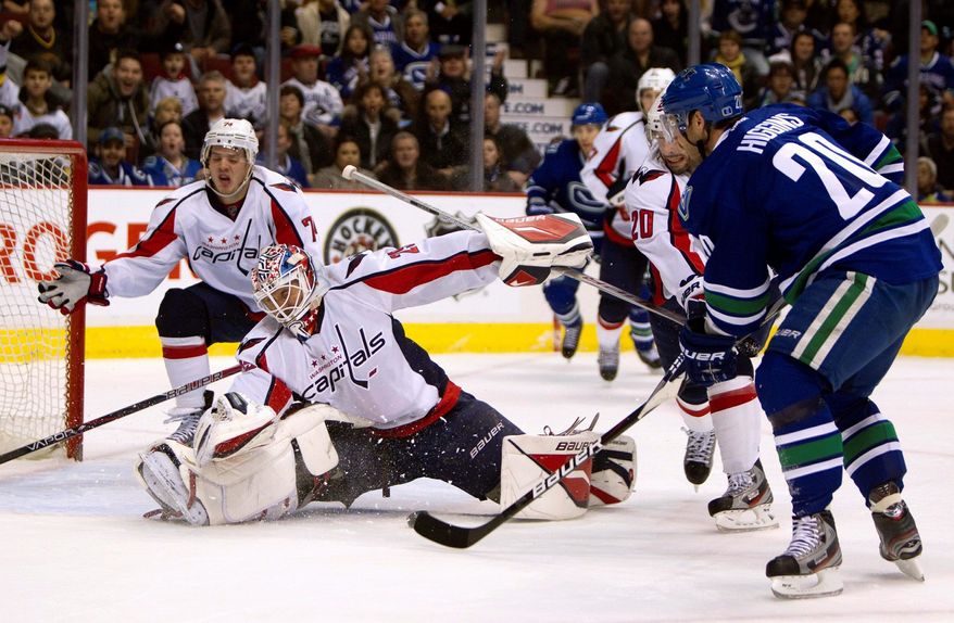 Capitals goalie Tomas Vokoun was pulled after giving up three goals in 17 shots during Saturday's loss. (Associated Press)
