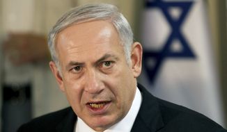 Prime Minister Benjamin Netanyahu&#39;s agreement on the prisoner swap shifted Israel&#39;s focus &quot;on much more troubling fronts - in distant Iran and in the Arab revolutions around us,&quot; a journalist wrote. (Associated Press)