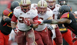 Boston College running back Rolandan Finch (28) churns out some of his 243 yards during a 28-17 win over Maryland at Byrd Stadium on Saturday. Finch also scored two touchdowns. (Associated Press)