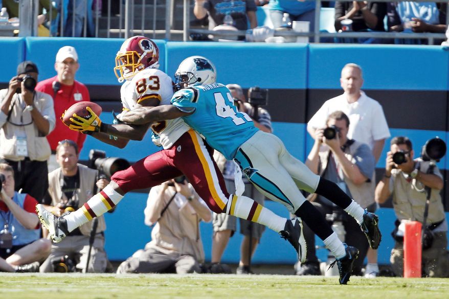Tight end Fred Davis, shown against Carolina on Oct. 23, leads the Redskins in receptions (36) and receiving yards (517). His status for Sunday's game against San Francisco is unknown because of a sprained ankle. (Associated Press)