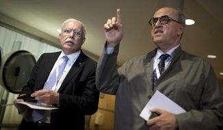 Palestinian Foreign Minister Riad al-Maliki (left) and Elias Sanbar, ambassador for Palestine at UNESCO, attend a session of UNESCO&#39;s 36th General Conference in Paris on Monday, Oct. 31, 2011. (AP Photo/Thibault Camus)