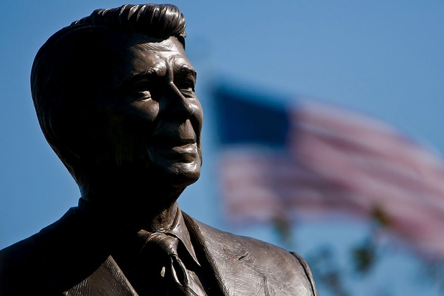 A bronze statue of Ronald Reagan is dedicated Nov. 1, 2011, at Reagan National Airport in Arlington, Va., on the centennial of the former president&#39;s birth. (T.J. Kirkpatrick/The Washington Times)