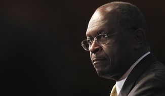 Republican presidential candidate Herman Cain speaks at the National Press Club in Washington on Oct. 31, 2011. (Associated Press)