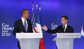 President Obama (left) and French President Nicolas Sarkozy make statements to reporters at the G-20 summit in Cannes, France, on Thursday, Nov. 3, 2011. (AP Photo/Charles Dharapak)