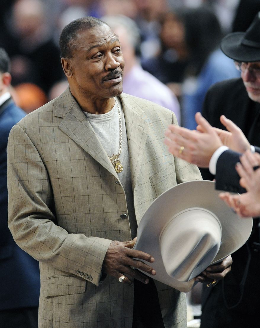 FIn this March 7, 2011, file photo, former heavyweight boxing champion Joe Frazier is introduced to the crowd at a New York Knicks NBA basketball game against the Utah Jazz at Madison Square Garden, in New York. Frazier is seriously ill with liver cancer. His personal and business manager says Saturday, Nov. 5, 2011, the 67-year-old boxer was diagnosed four or five weeks ago and is under hospice care. (AP Photo/Bill Kostroun, File)