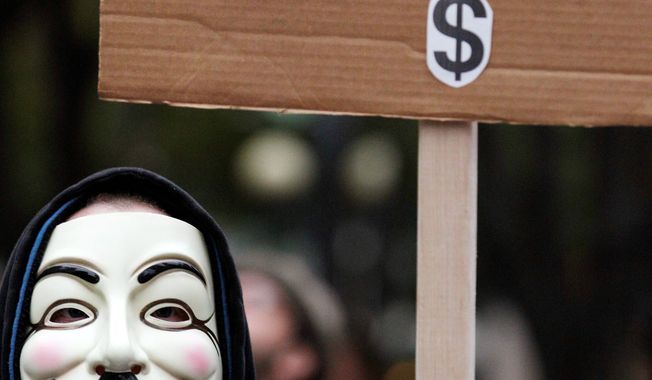 Whether they know it or not, some of the demonstrators decrying a variety of society&#x27;s ills are sporting the stylized masks loosely modeled on 17th-century terrorist Guy Fawkes. The Catholic insurrectionist was executed four centuries ago for trying to blow up the British Parliament. (Associated Press)