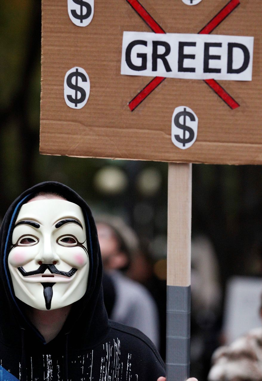 Whether they know it or not, some of the demonstrators decrying a variety of society's ills are sporting the stylized masks loosely modeled on 17th-century terrorist Guy Fawkes. The Catholic insurrectionist was executed four centuries ago for trying to blow up the British Parliament. (Associated Press)