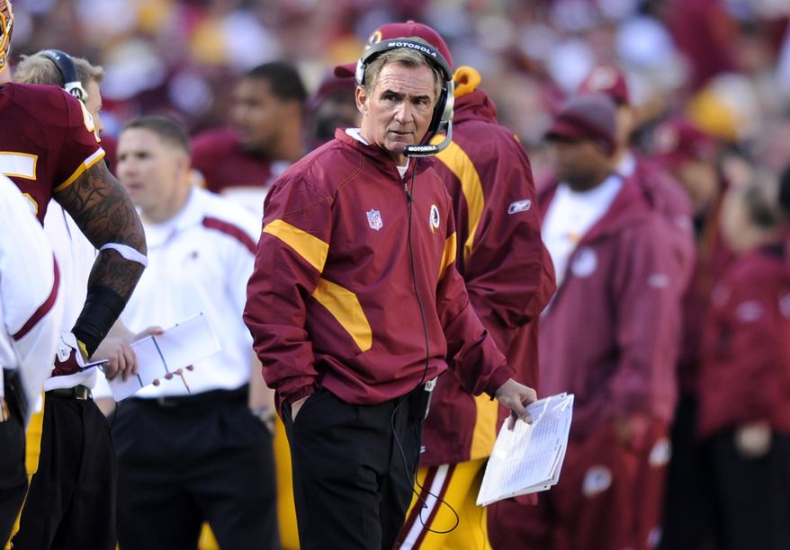 Washington Redskins head coach Mike Shanahan looks on from the sideline during the football game against the San Francisco 49ers in Landover, Md., Sunday, Nov. 6, 2011. Washington lost 19-11. (AP Photo/Nick Wass)
