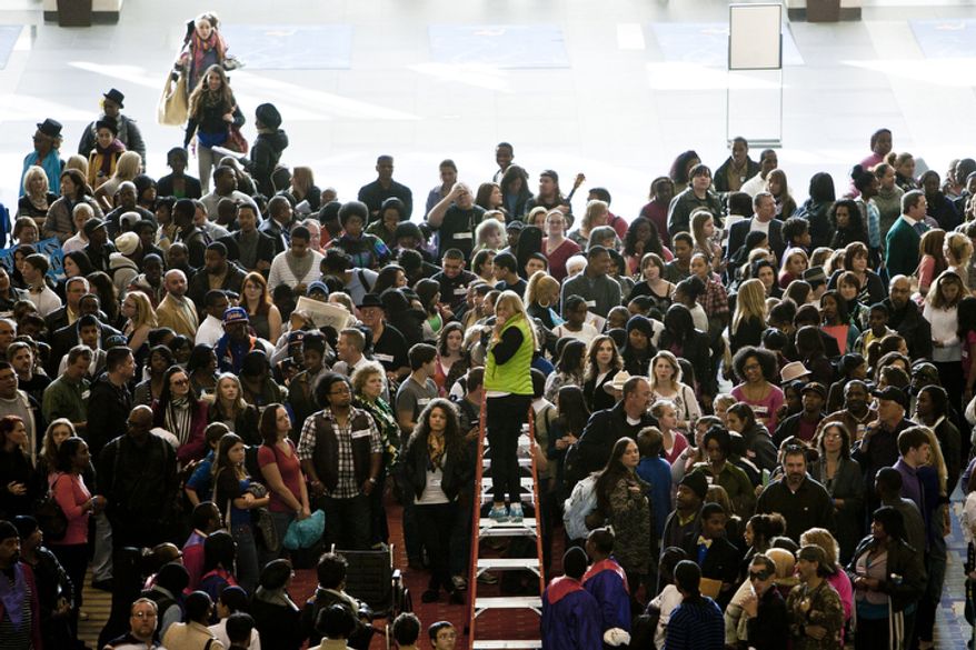 A crowd is directed for a television shot while waiting to audition for America's Got Talent.
(T.J. Kirkpatrick/ The Washington Times)