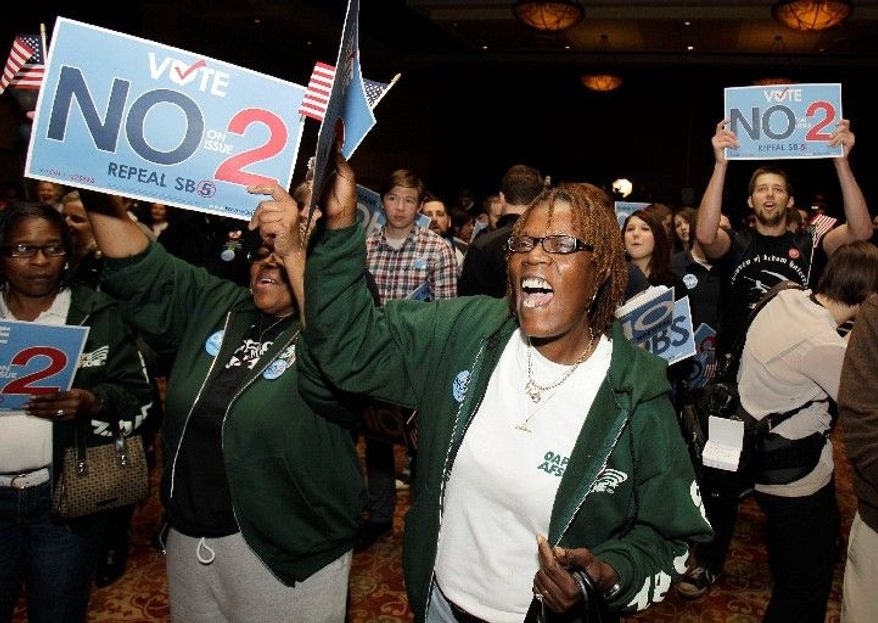 Charlene Petties, a custodian in the Columbus, Ohio, school system, supports the repeal of Senate Bill 5 during a rally on Tuesday in Columbus. The measure's repeal by voters was a stinging loss for Gov. John Kasich. (Associated Press)