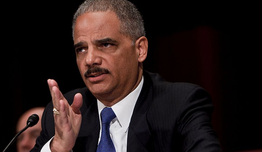 Attorney General Eric H. Holder Jr. testifies before the Senate Judiciary Committee in Washington on Tuesday, Nov. 8, 2011. Mr. Holder was scrutinized for his role in allowing, or at least not preventing, a controversial tactic that allowed illegal guns to be smuggled into Mexico. (T.J. Kirkpatrick/The Washington Times)