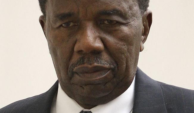 Sen. Ulysses Currie, Prince George&#x27;s Democrat, leaves the U.S. District Courthouse in Baltimore, Thursday, Oct. 13, 2011, after a federal bribery case against him finished for the day. (AP Photo/Patrick Semansky)