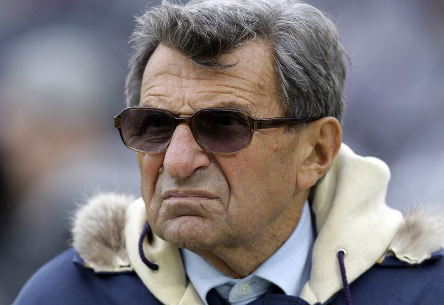 Penn State coach Joe Paterno has been fired by the university's board of trustees. (AP Photo/Carolyn Kaster, File)