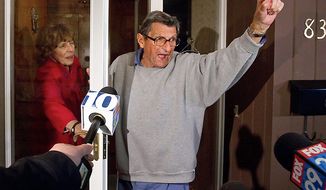 Ousted Penn State coach Joe Paterno and his wife, Sue, on the front porch of their house, address students on Wednesday, Nov. 9, 2011. The students yelled, &quot;We are Penn State!&quot; to which Paterno responded, &quot;Yes, we are!&quot;  (AP Photo/The Patriot-News, Joe Hermitt)