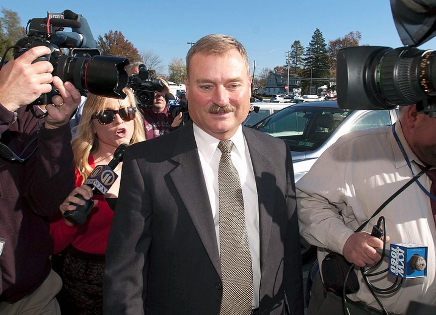 Former Penn State Vice President Gary Schultz enters the courtroom for his arraignment on Monday, Nov. 7, 2011, in Harrisburg, Pa. Schultz and former Penn State Athletic Director Tim Curley surrendered on charges of perjury and failure to report abuse surrounding allegations that former Penn State football defensive coordinator Jerry Sandusky sexually abused boys. (AP Photo/York Daily Record, Jason Plotkin)