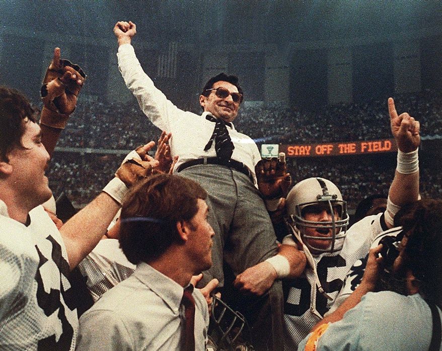 ** FILE ** Penn State football coach Joe Paterno is carried off the field after a 27-23 victory against Georgia in the Sugar Bowl to claim the national championship at the Superdome in New Orleans on Jan. 2, 1983. (AP Photo/File)