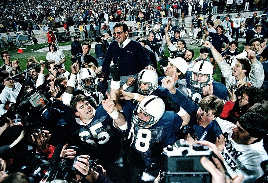In this Jan. 2, 1987 file photo, Penn State coach Joe Paterno is carried after defeating Miami, 14-10, in the Fiesta Bowl, to win the national championship, in Tempe, Ariz. Paterno say he plans to retire at the end of the season, his long and illustrious career brought down because he failed to do all he could about an allegation of child sex abuse against a former assistant. (AP Photo/Jim Gerberich, File)