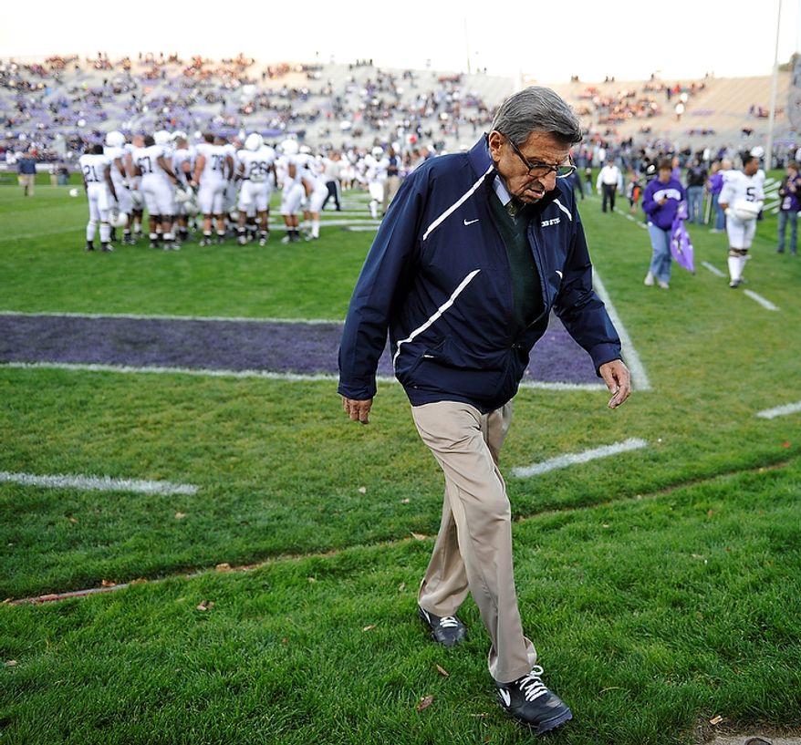 In this file photo taken Oct. 22, 2011, Penn State coach Joe Paterno walks off the field after warmups before Penn State's NCAA college football game against Northwestern in Evanston, Ill. Penn State administrators canceled Paterno's weekly news conference Tuesday Nov. 8, 2011 in which he was expected to field questions about a sex abuse scandal involving a former assistant coach. Paterno's son Scott tells The Associated Press that the decision was made by president Graham Spanier's office. (AP Photo/Jim Prisching, File)