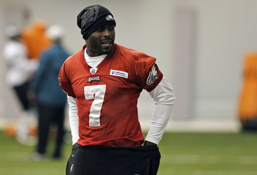 Philadelphia Eagles quarterback Michael Vick walks on the field during an indoor practice Wednesday, Nov. 16, 2011 in Philadelphia. He has thrown 11 touchdowns and 11 interceptions this season. (AP Photo/Alex Brandon)