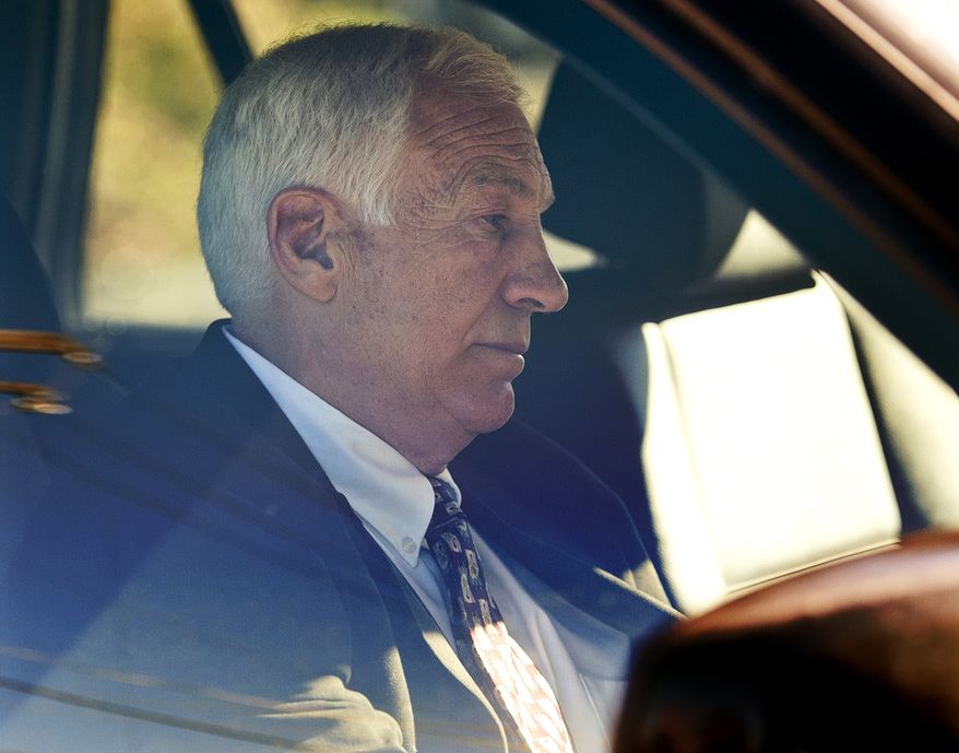 FILE - In this Nov. 5, 2011 file photo, former Penn State football defensive coordinator Gerald &quot;Jerry&quot; Sandusky sits in a car as he leaves the office of Centre County Magisterial District Judge Leslie A. Dutchcot in State College, Pa. Sandusky, who is charged with sexually abusing eight boys in a scandal that has rocked the university, said in an telephone interview with Bob Costas Monday night on NBC News&#x27; &quot;Rock Center&quot; that there was no abuse and that any activities in a campus shower with a boy were just horseplay, not molestation. (AP Photo/The Patriot-News, Andy Colwell, File)