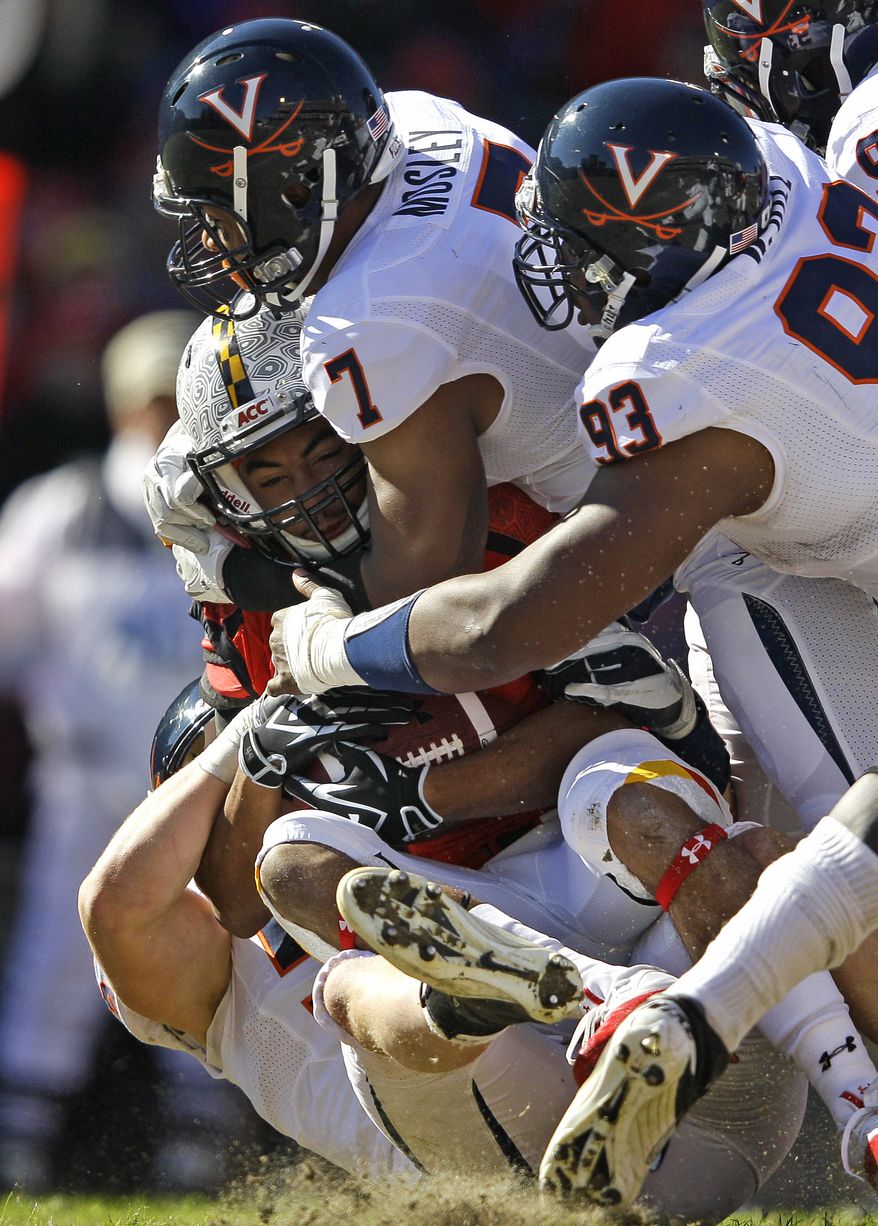 Virginia's defense ranks 30th in the nation --- fourth in the ACC --- as it has allowed 21.6 points per game this season. Last year, the defense was 10th in the ACC, allowing 28.3 points per game. (AP Photo/Patrick Semansky)