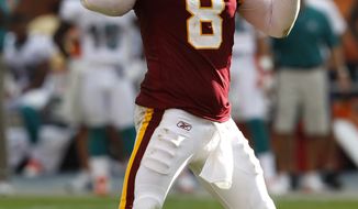 Washington Redskins quarterback Rex Grossman has thrown for 1,347 yards, six touchdowns and 11 interceptions this season, and is being given a second shot at leading the offense. Coaches were happy with his play against the Miami Dolphins last week --- 21 of 32 for 215 yards, no touchdowns --- despite the two picks he threw. Washington will look to snap its five-game losing streak against the Dallas Cowboys on Sunday. (AP Photo/Hans Deryk)