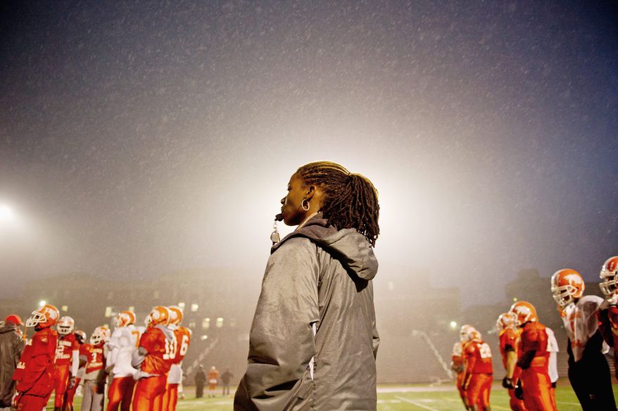 Coolidge High School varsity football coach Natalie Randolph is in her second year of coaching and some of the novelty of a woman heading a boys football team has worn off. (Andrew Harnik/The Washington Times)