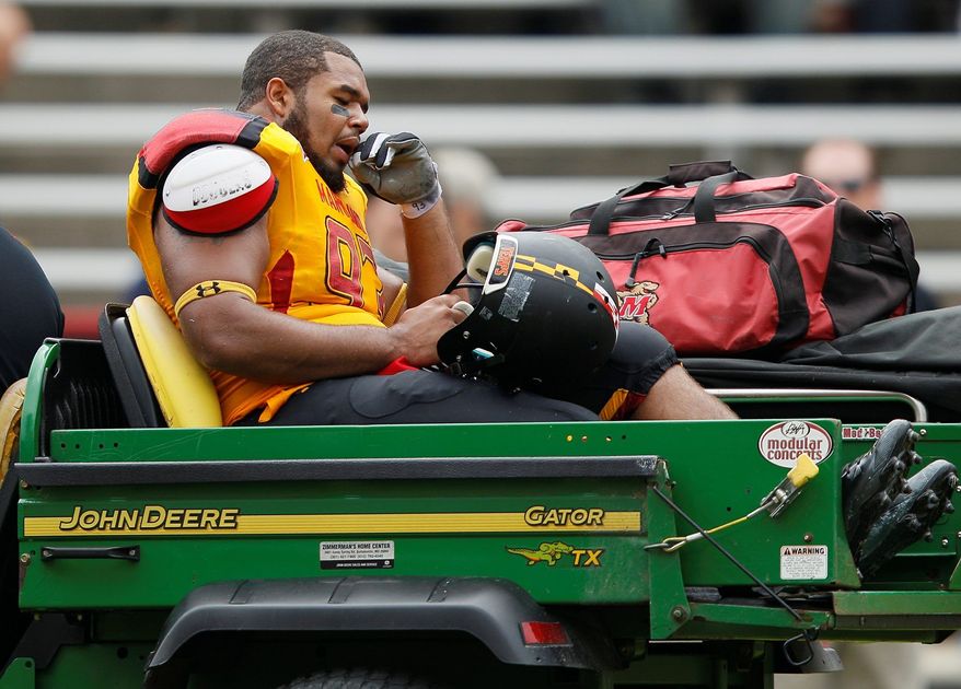 Maryland defensive lineman Andre Monroe, shown after injuring an ankle Sept. 24, is one of only three Maryland freshmen to record five sacks since 2001. (Associated Press)