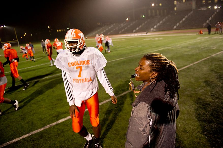 Coolidge High School Football Coach Natalie Randolph gets her team ready for the Turkey Bowl, Washington, DC, Monday, November 21, 2011. (Andrew Harnik/The Washington Times)