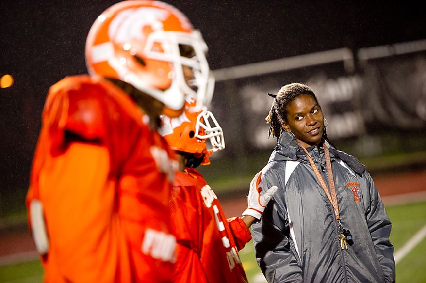 Coolidge High School Football Coach Natalie Randolph gets her team ready for the Turkey Bowl, Washington, DC, Monday, November 21, 2011. (Andrew Harnik/The Washington Times)