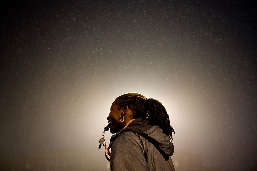 Coolidge High School Football Coach Natalie Randolph gets her team ready for the Turkey Bowl, Washington, DC, Monday, November 21, 2011. (Andrew Harnik/The Washington Times)