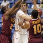 Iona’s Sean Armand, left, and Iona’s Jermel Jenkins, right, pressure Maryland’s Berend Weijs during a NCAA basketball game in San Juan, Puerto Rico, Sunday, Nov. 20, 2011. Maryland went 1-2 in the Puerto Rico Tip-Off tournament. (AP Photo/Ricardo Arduengo)