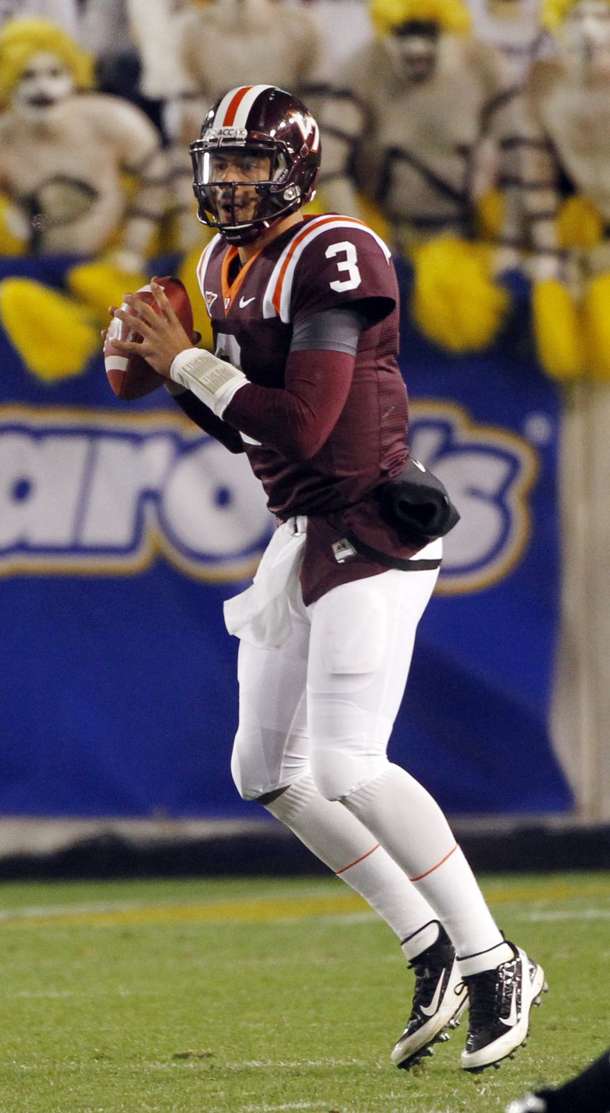 Virginia Tech quarterback is a dual threat, totaling 2,338 yards and 16 touchdowns in the air and 387 yards and nine touchdowns on the ground. (AP Photo/John Bazemore)